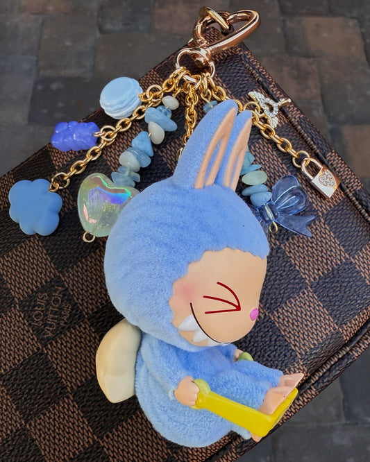 “Stretch Out” Labubu with lock and key