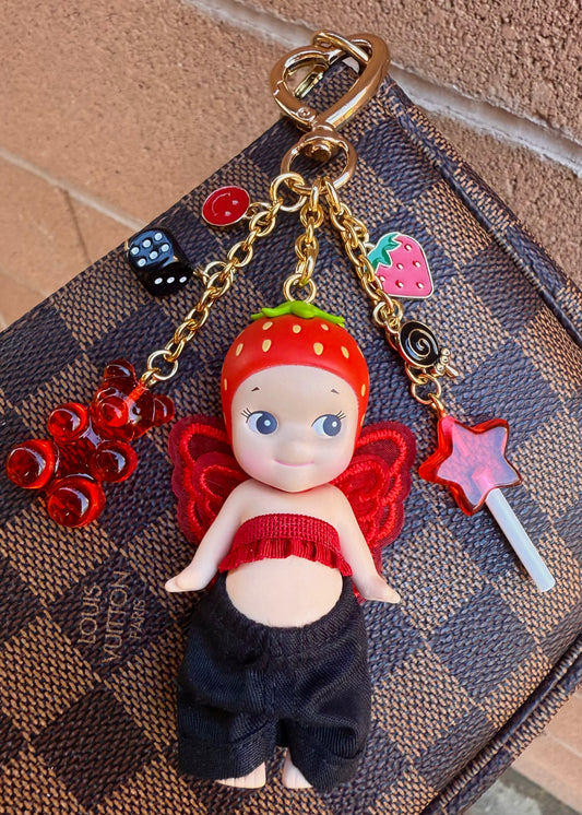 Gold Strawberry with black pants