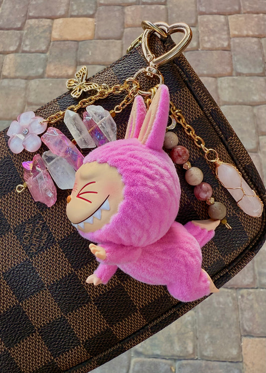 “Sweating” Labubu with rose quartz