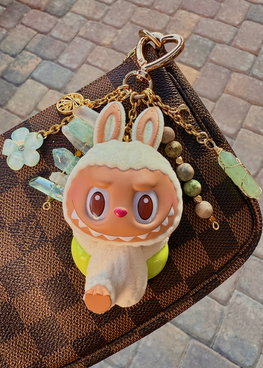 “Lay Down” Labubu with green calcite