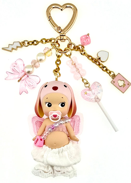 Gold Lop with pacifier and purse