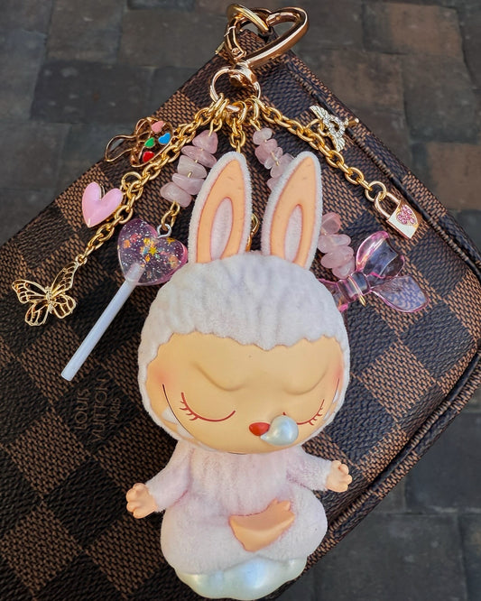 “Sleeping” Labubu with lock and key