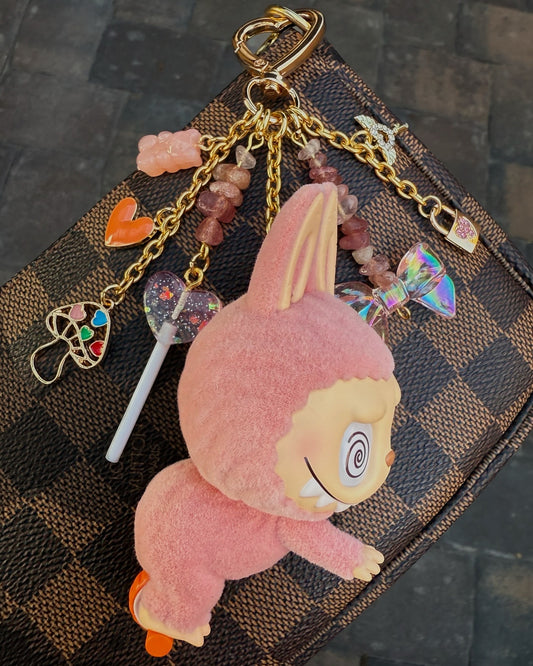 “Ab Roller” Labubu with lock and key